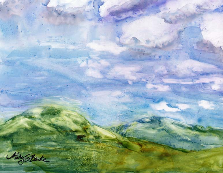 Watercolor on Yupo painting of the top of mountains on Trail Ridge Road with a dramatic sky and clouds by Mary Benke