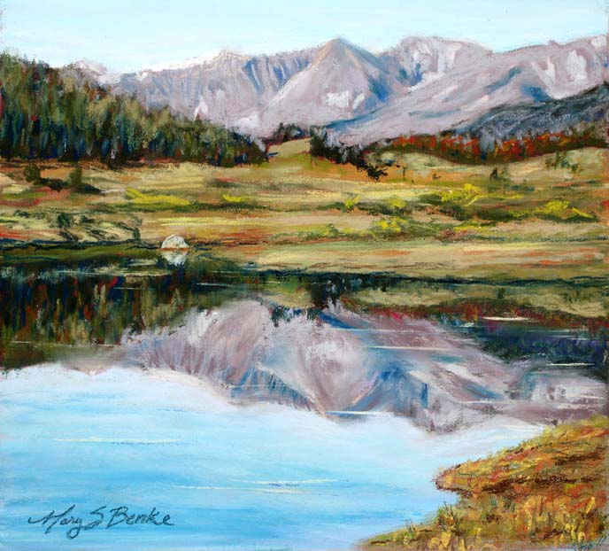 Pastel landscape of the mountains at Long Draw Reservoir reflected perfectly in the water by Mary Benke