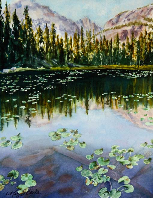 Landscape watercolor painting of Rocky Mountain National Park's Nymph Lake with mountains, pine trees, and water lilies reflected in the lake by Mary Benke