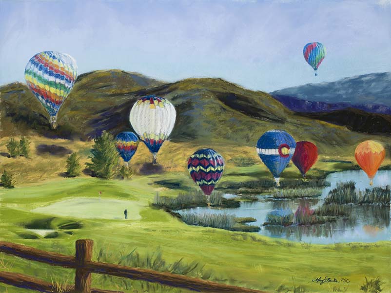 Hot air balloons soar over a golf course in this colorful landscape pastel from Colorado's high country by Mary Benke