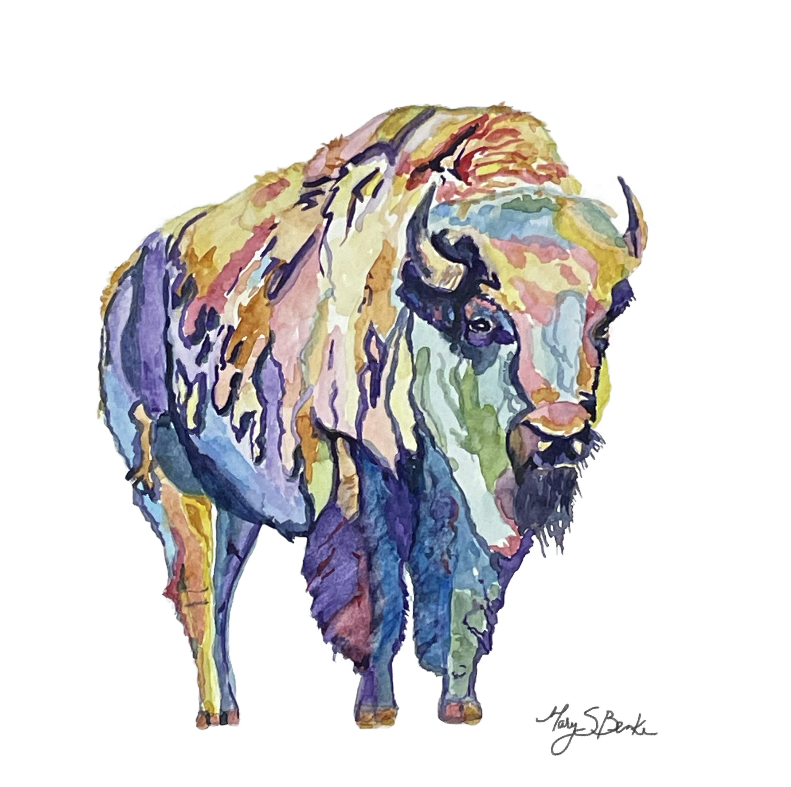 Painted in a fun, colorful style, this watercolor bison's rainbow-colored hide and face stand out against a stark white background by Mary Benke