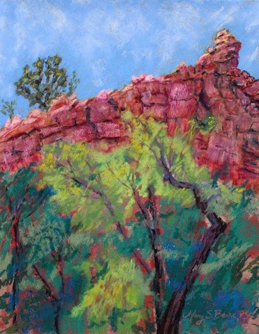 Pastel landscape painted en plein air of a unique red rock formation with bright teal and green foliage in the foreground by Mary Benke