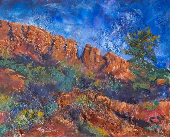 Highly textural oil paint makes the red rocks of iconic Horsetooth Mountain in Northern Colorado stand out against an brilliant blue evening sky. Painting by Mary Benke