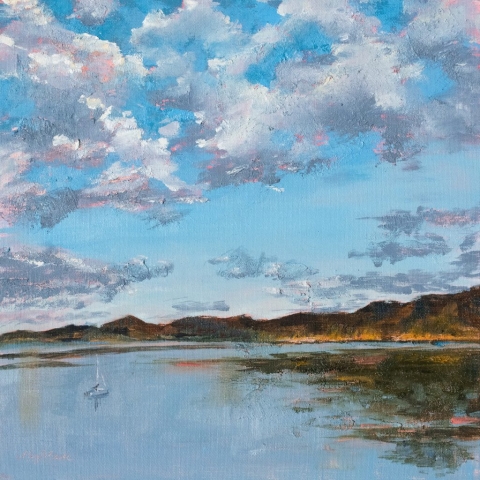This glorious sunrise over Carter Lake in the summer is painted in oil. Dramatic clouds hover over a calm lake where a lone sailboat is moored. Painting by Mary Benke