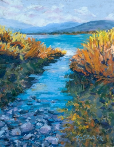 Pastel painting of a brilliant blue lake inlet surrounded by vibrant fall foliage with Tetons in the background by Mary Benke