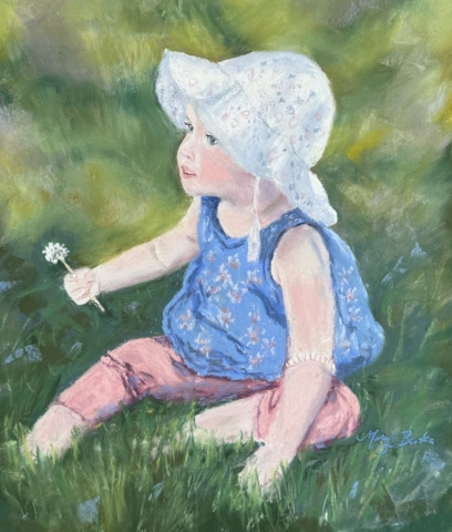 A young girl in a sunhat is seated on a grassy surface, holding a small flower. The expression on the child's face seems thoughtful and absorbed, with their gaze directed off to the side by Mary Benke