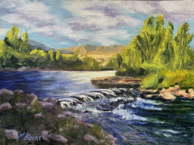 A serene landscape is depicted with vibrant green trees flanking the sides of a gently flowing river. The water cascades over small rocks creating a miniature waterfall, under a sky filled with soft, pastel hues by Mary Benke
